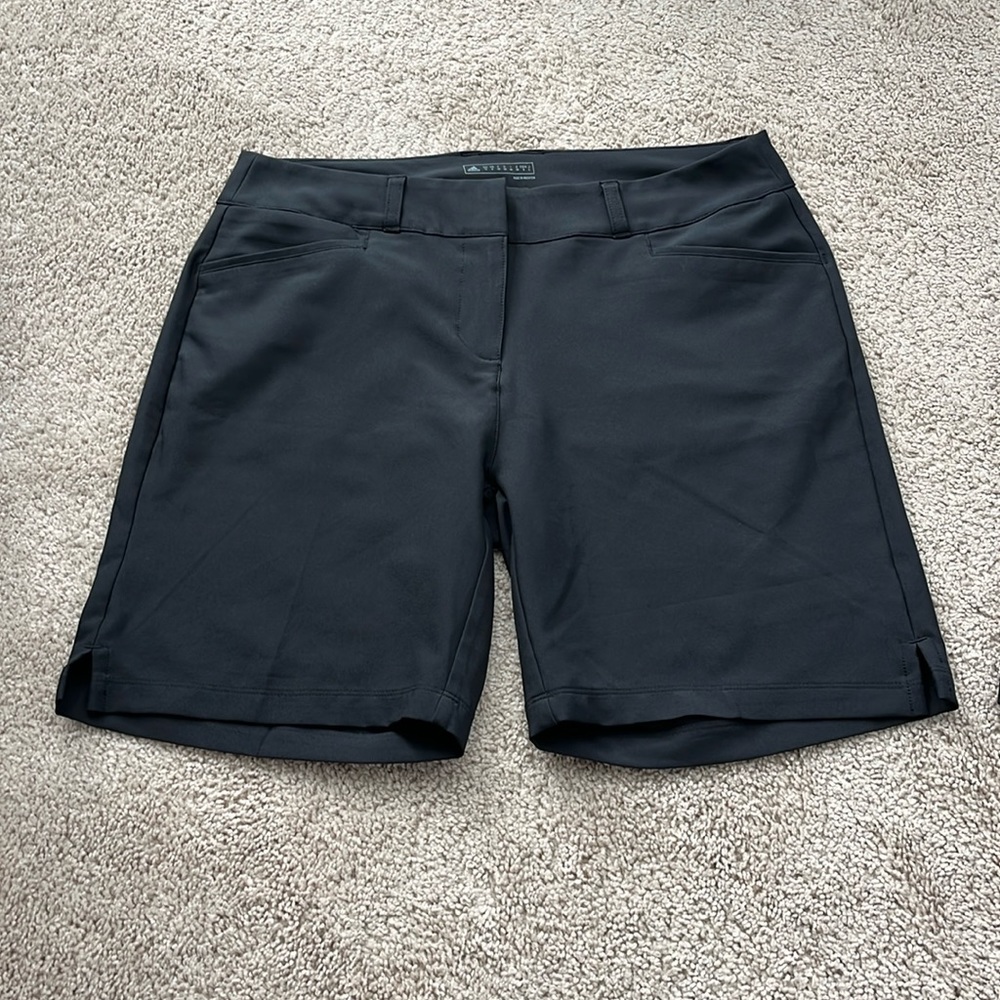 Two pair of black adidas shorts size 8. Brand new.